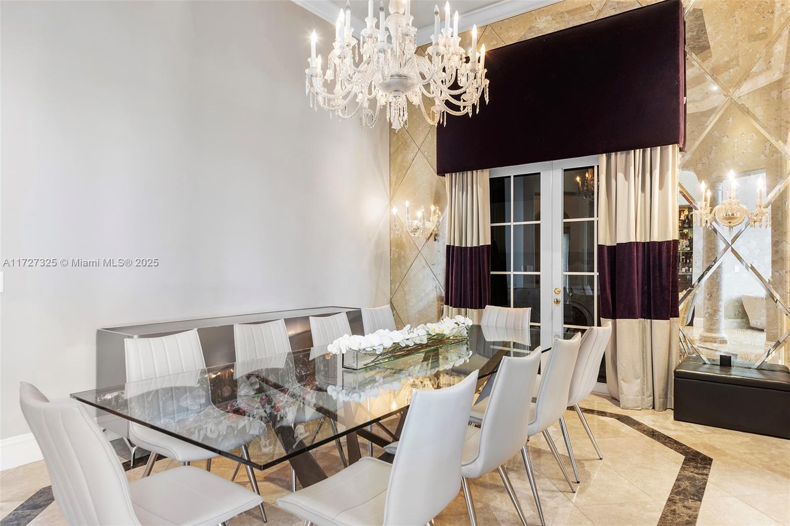 3914 Island Estates Drive Aventura, FL 33160 - Photo 15 of 40 a view of a dining room with furniture a chandelier and wooden floor