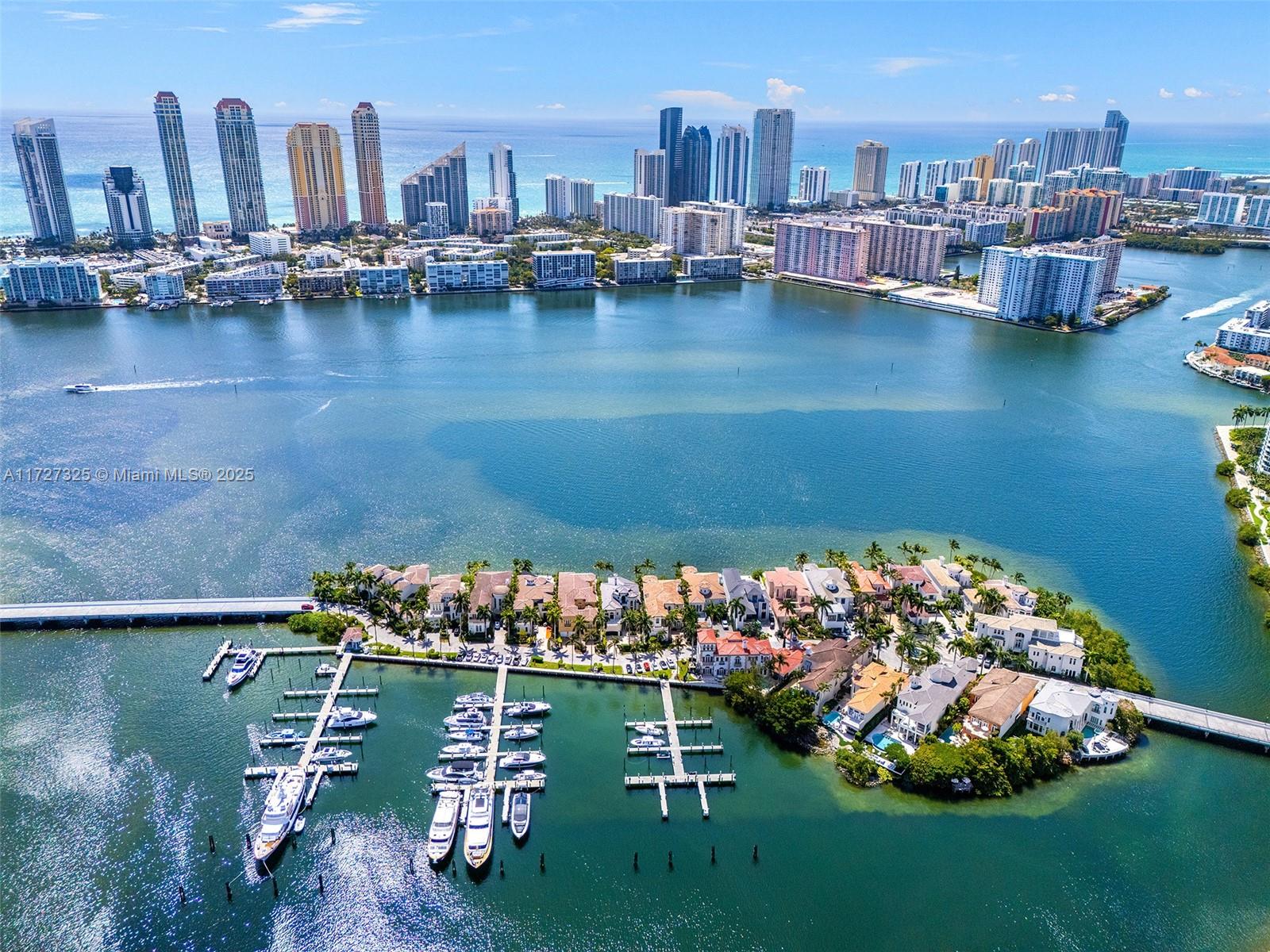3914 Island Estates Drive Aventura, FL 33160 - Photo 3 of 40 a view of a lake with a large mountain view