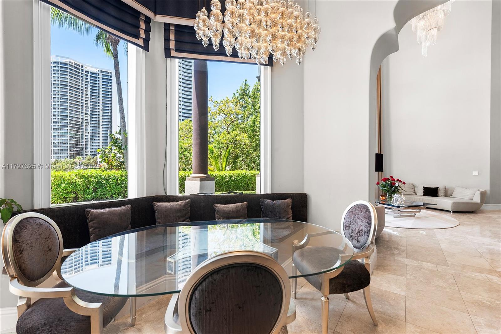 3914 Island Estates Drive Aventura, FL 33160 - Photo 31 of 40 a living room with furniture and a large window
