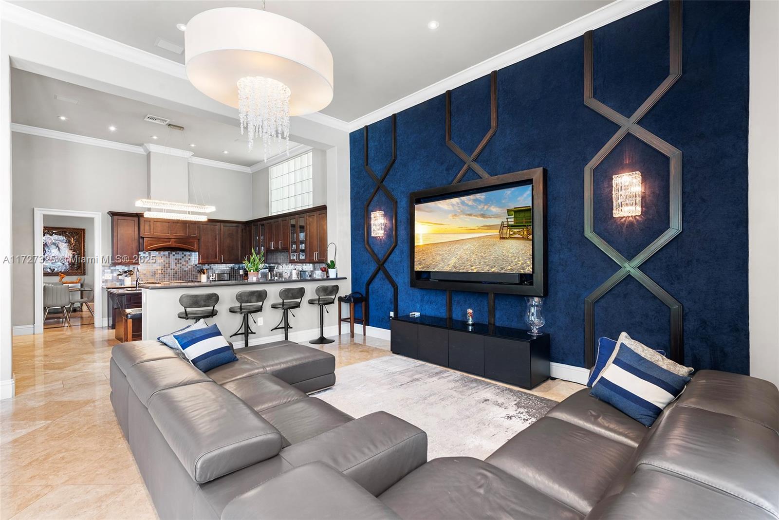 3914 Island Estates Drive Aventura, FL 33160 - Photo 34 of 40 a living room with furniture and a flat screen tv