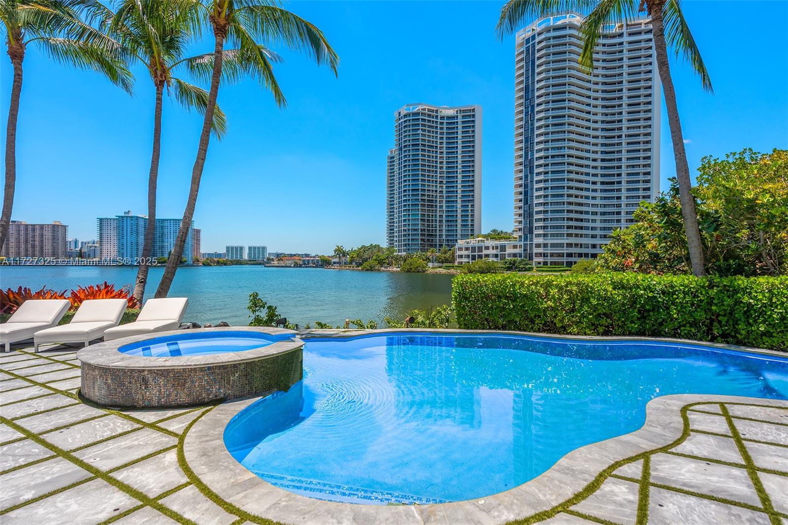 3914 Island Estates Drive Aventura, FL 33160 - Photo 10 of 40 a view of a swimming pool with outdoor seating