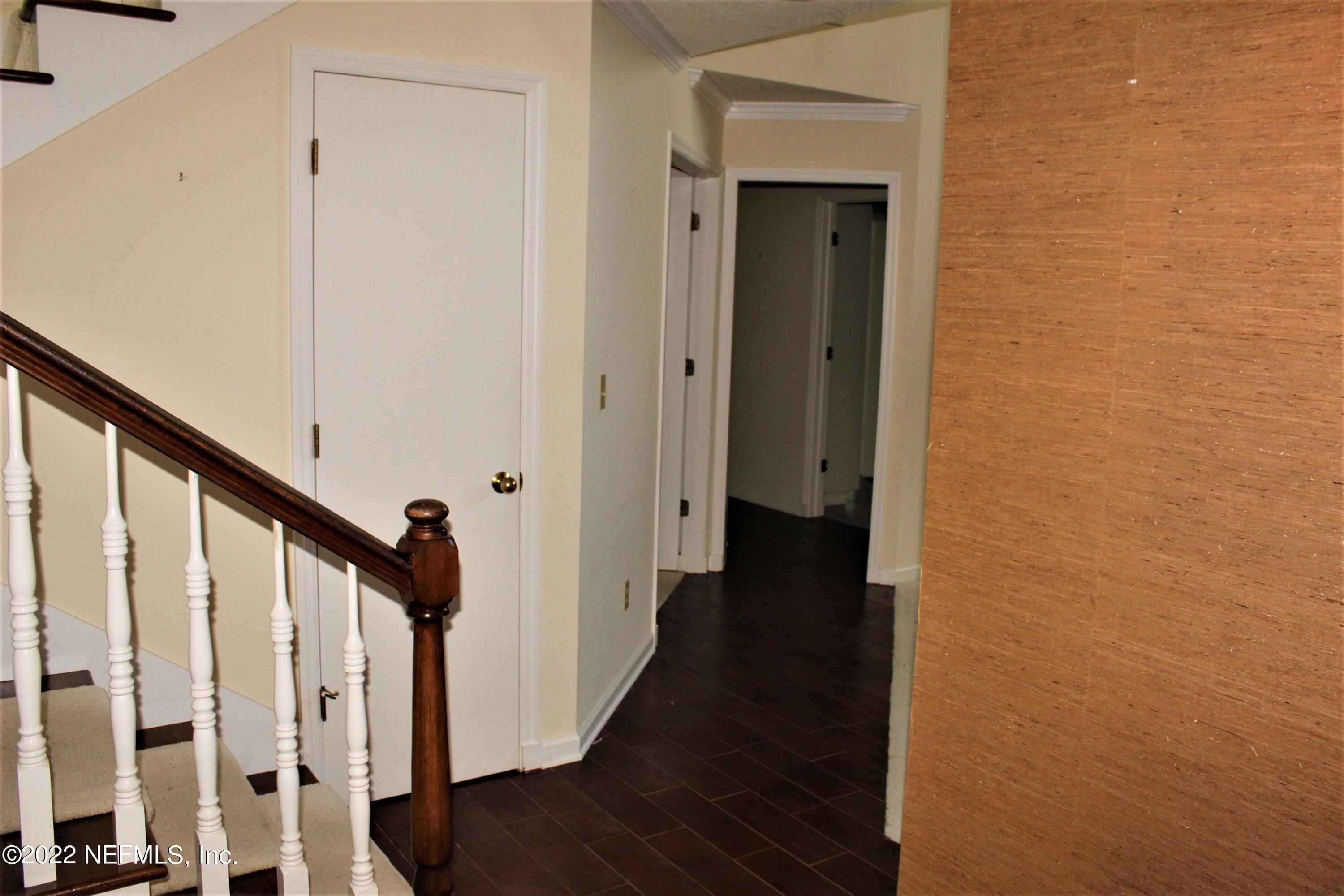 5018 Rivebrook Court Jacksonville, FL 32277 - Photo 29 of 45 Going towards guest bedrooms
