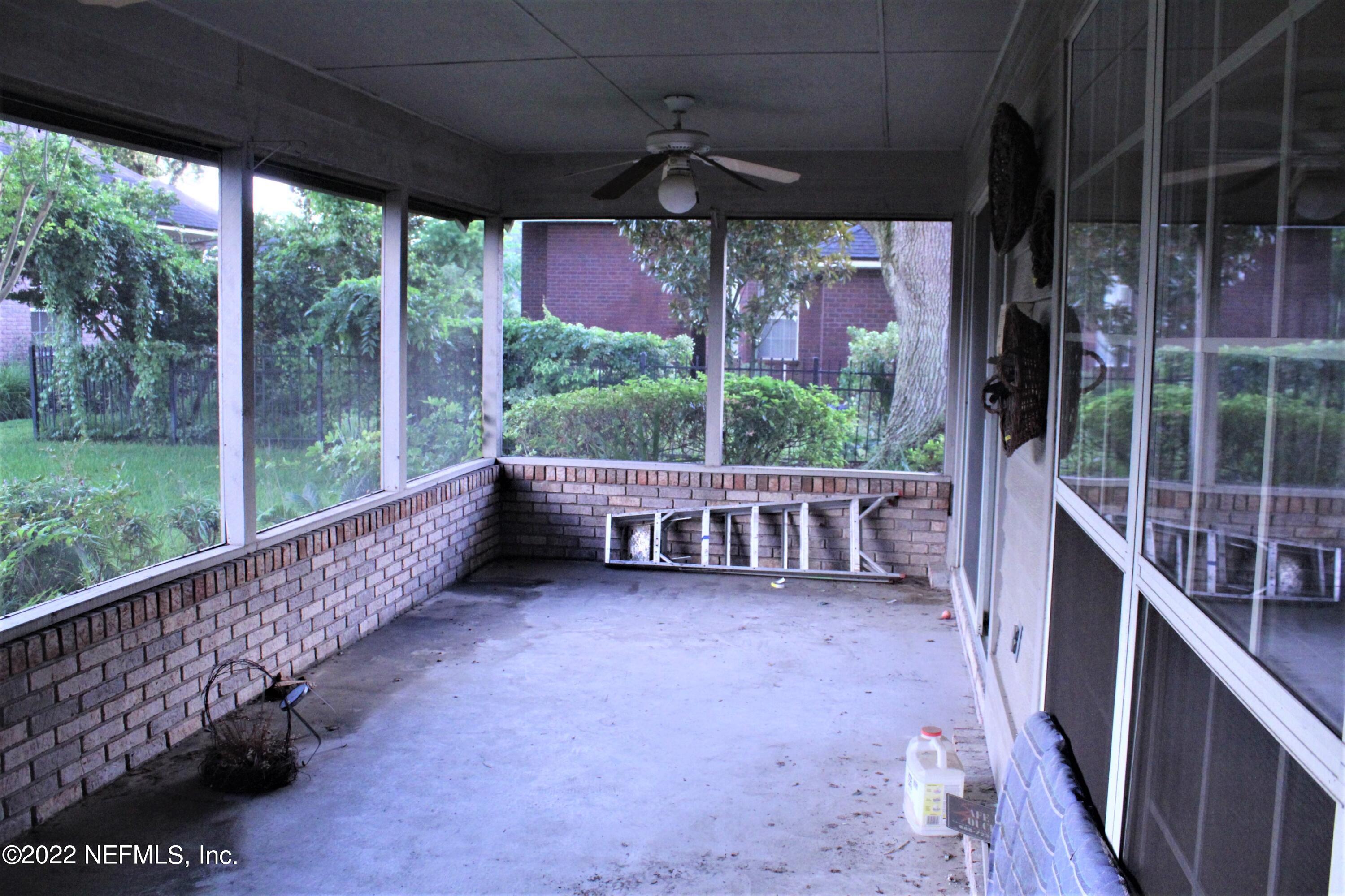 5018 Rivebrook Court Jacksonville, FL 32277 - Photo 39 of 45 Back Screened Porch