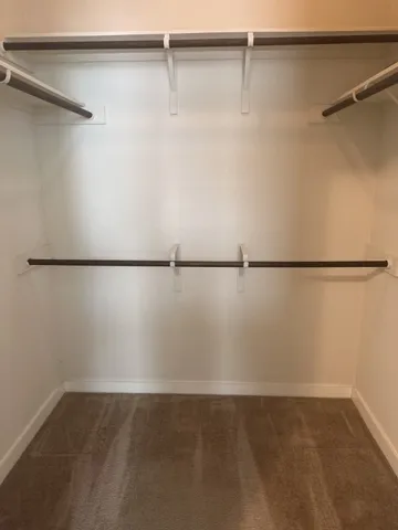 a close view of a walk in closet