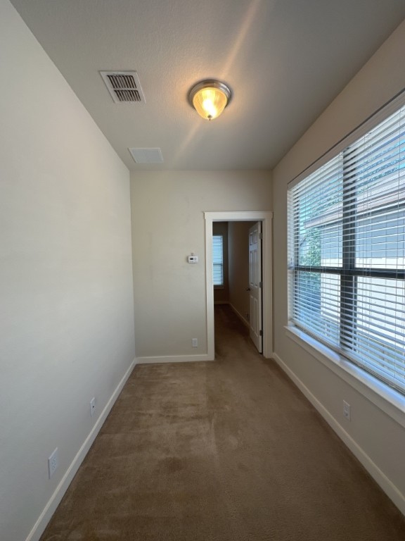 2101 Rivers Edge Way, Unit 32 Austin, TX 78741 - Photo 17 of 22 a view of an empty room with a window