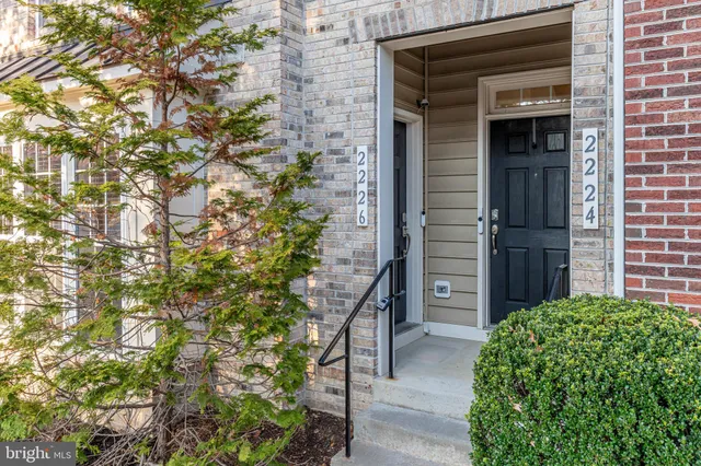 a house with a tree in front of it