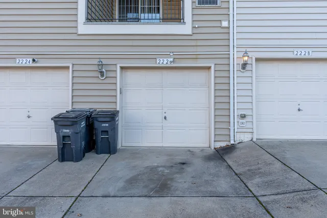 a kitchen with stainless steel appliances granite countertop a stove microwave and sink