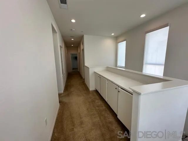 2036 Mayon Road Chula Vista, CA 91915 - Photo 23 of 49 a bathroom with a sink and a mirror