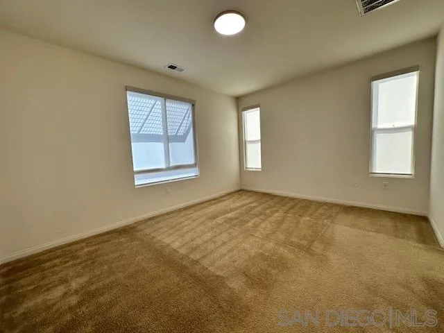 2036 Mayon Road Chula Vista, CA 91915 - Photo 24 of 49 an empty room with windows