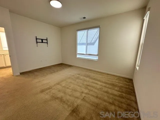 2036 Mayon Road Chula Vista, CA 91915 - Photo 25 of 49 an empty room with windows