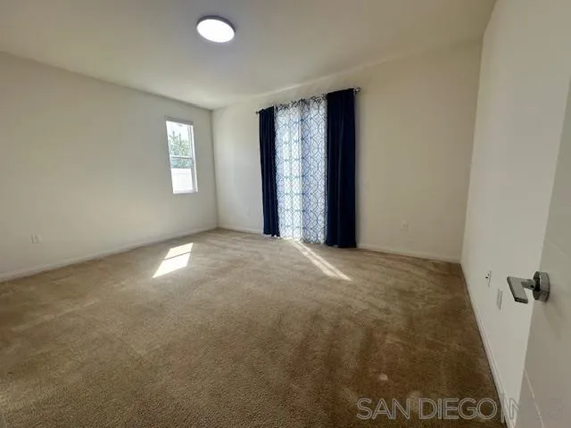 2036 Mayon Road Chula Vista, CA 91915 - Photo 3 of 49 an empty room with windows