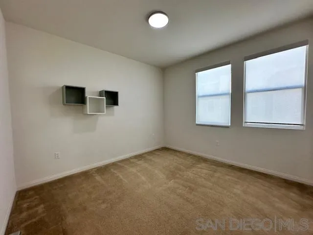 2036 Mayon Road Chula Vista, CA 91915 - Photo 35 of 49 an empty room with windows