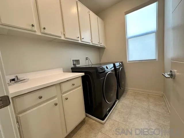 2036 Mayon Road Chula Vista, CA 91915 - Photo 38 of 49 a utility room with sink dryer and washer