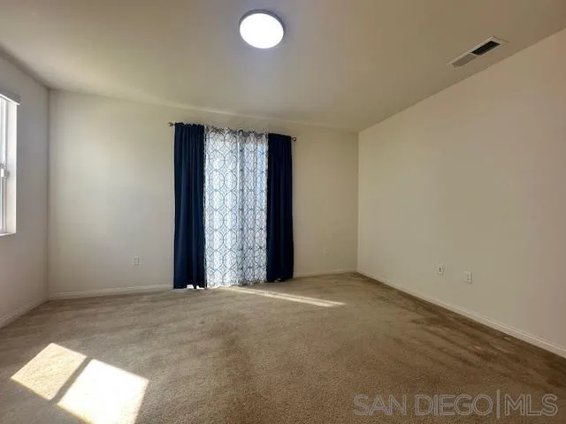 2036 Mayon Road Chula Vista, CA 91915 - Photo 7 of 49 an empty room with windows