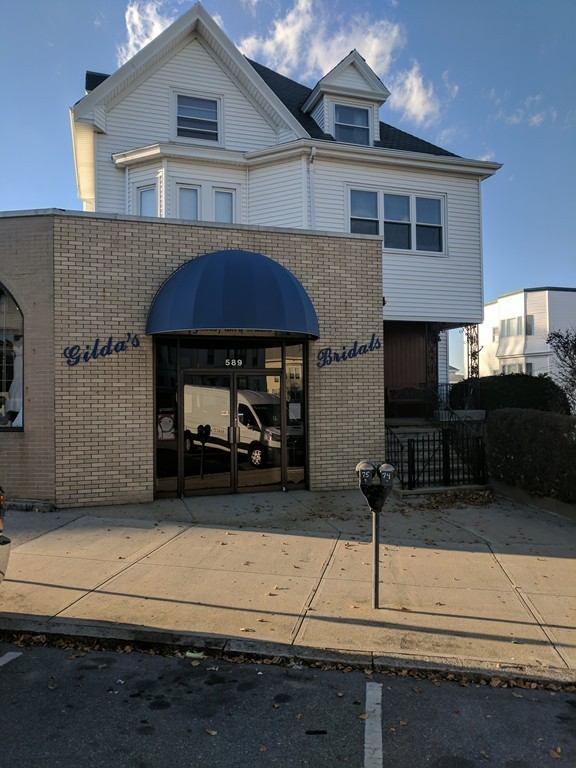 589 South Main Street Fall River, MA 02721 - Photo 3 of 30 a front view of a house with a yard