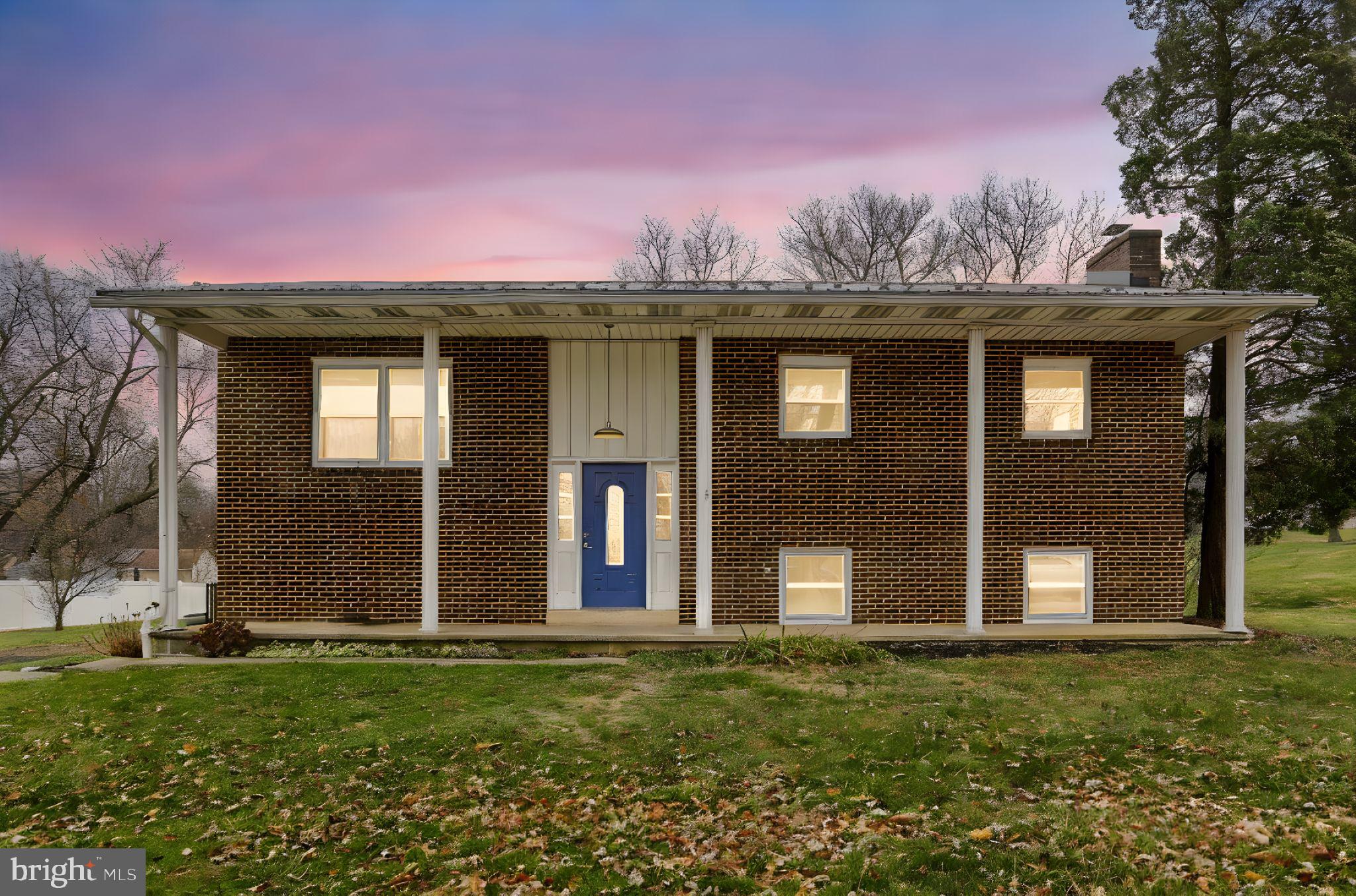 127 Spring Road Dillsburg, PA 17019 - Photo 2 of 39 front view of a house with a yard