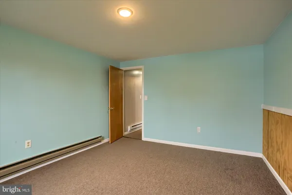 an empty room with an entryway