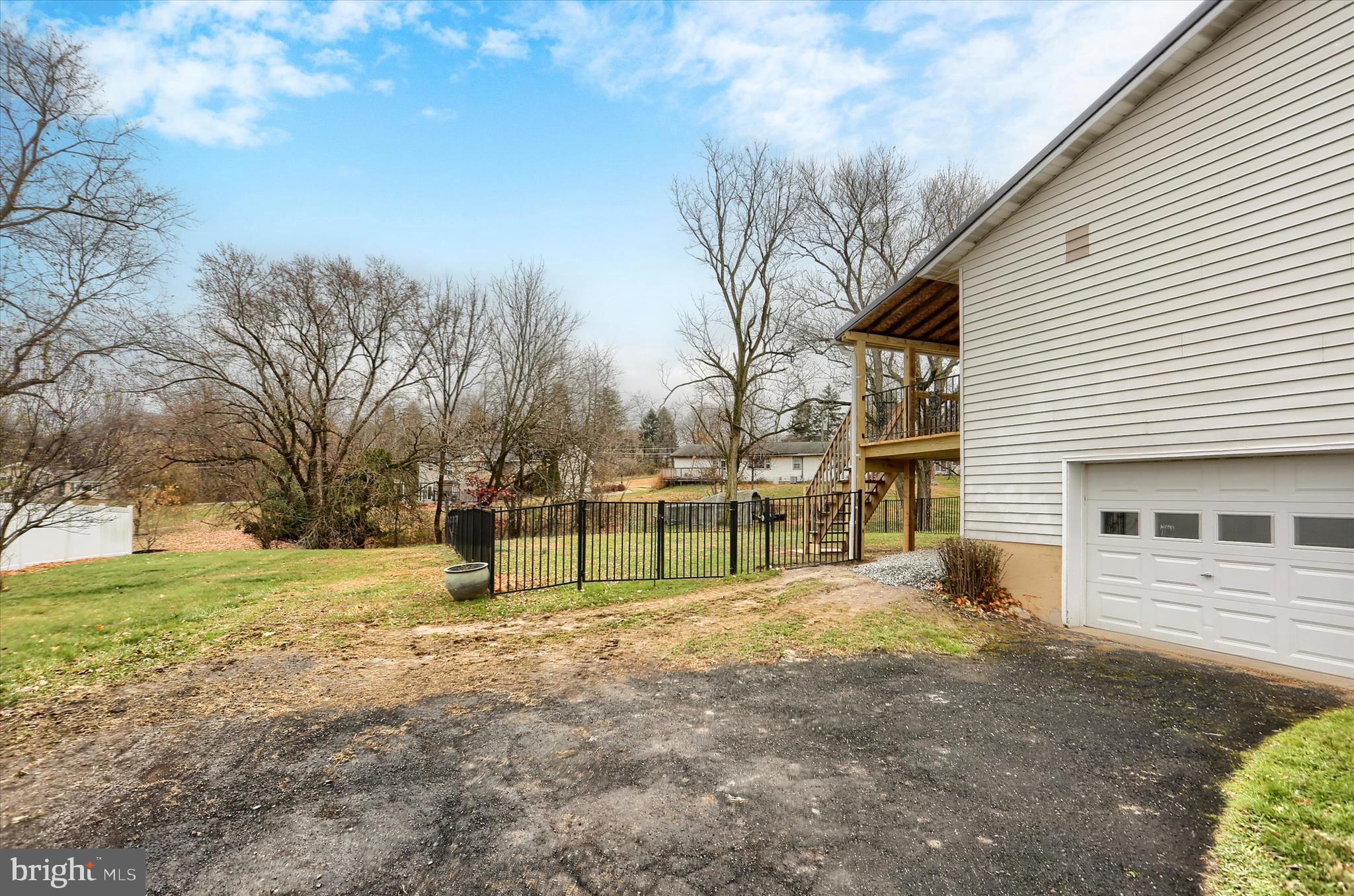 127 Spring Road Dillsburg, PA 17019 - Photo 32 of 39 a view of a house with a yard