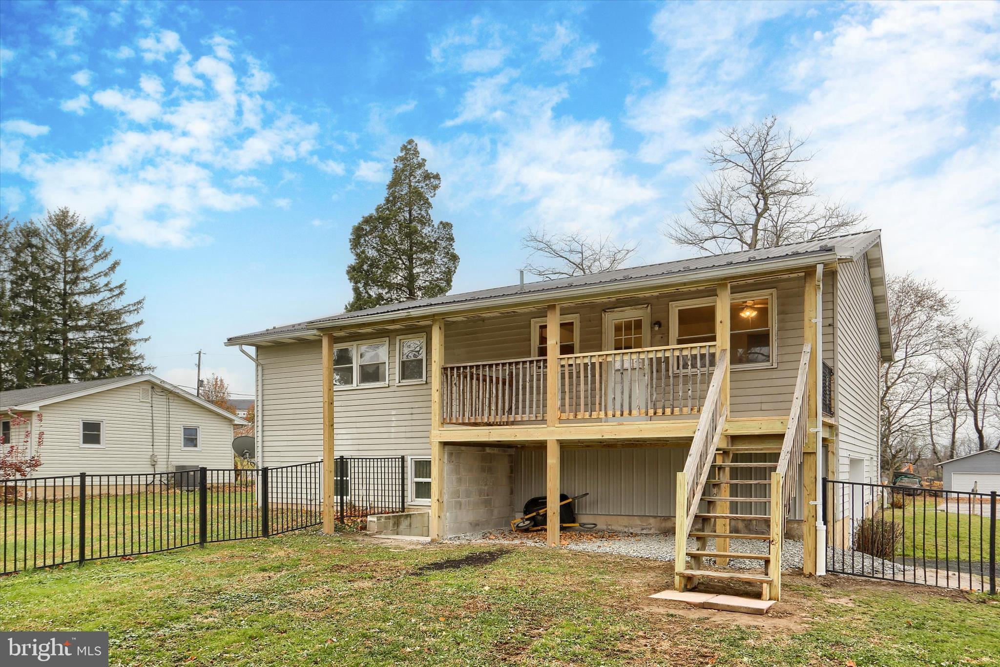 127 Spring Road Dillsburg, PA 17019 - Photo 33 of 39 a front view of a house with a yard