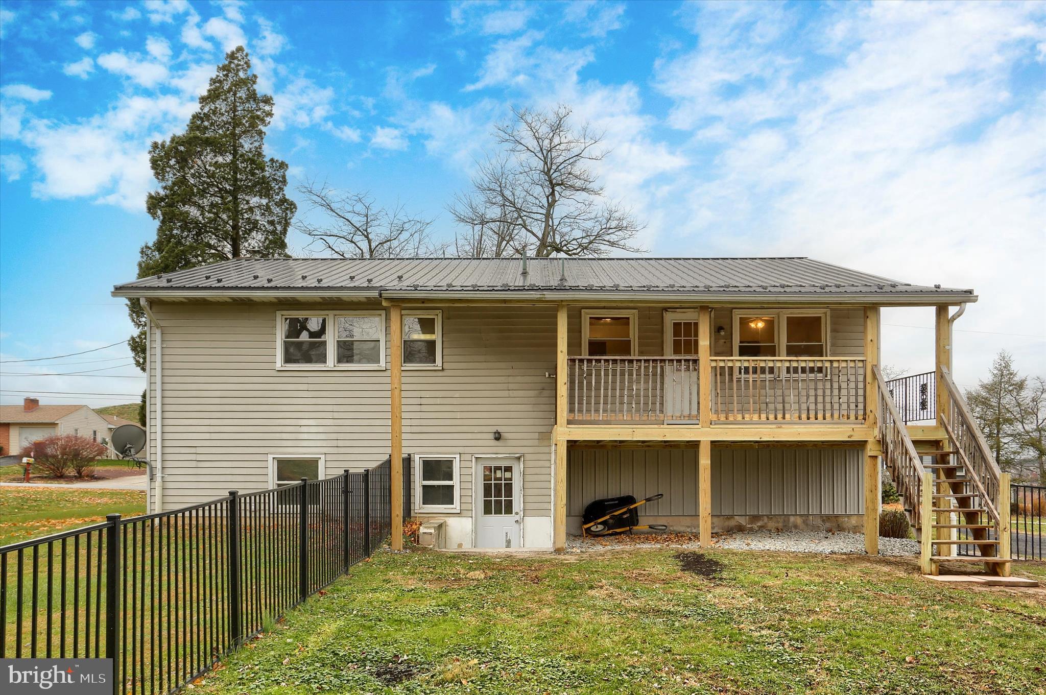 127 Spring Road Dillsburg, PA 17019 - Photo 34 of 39 a front view of a house with a yard