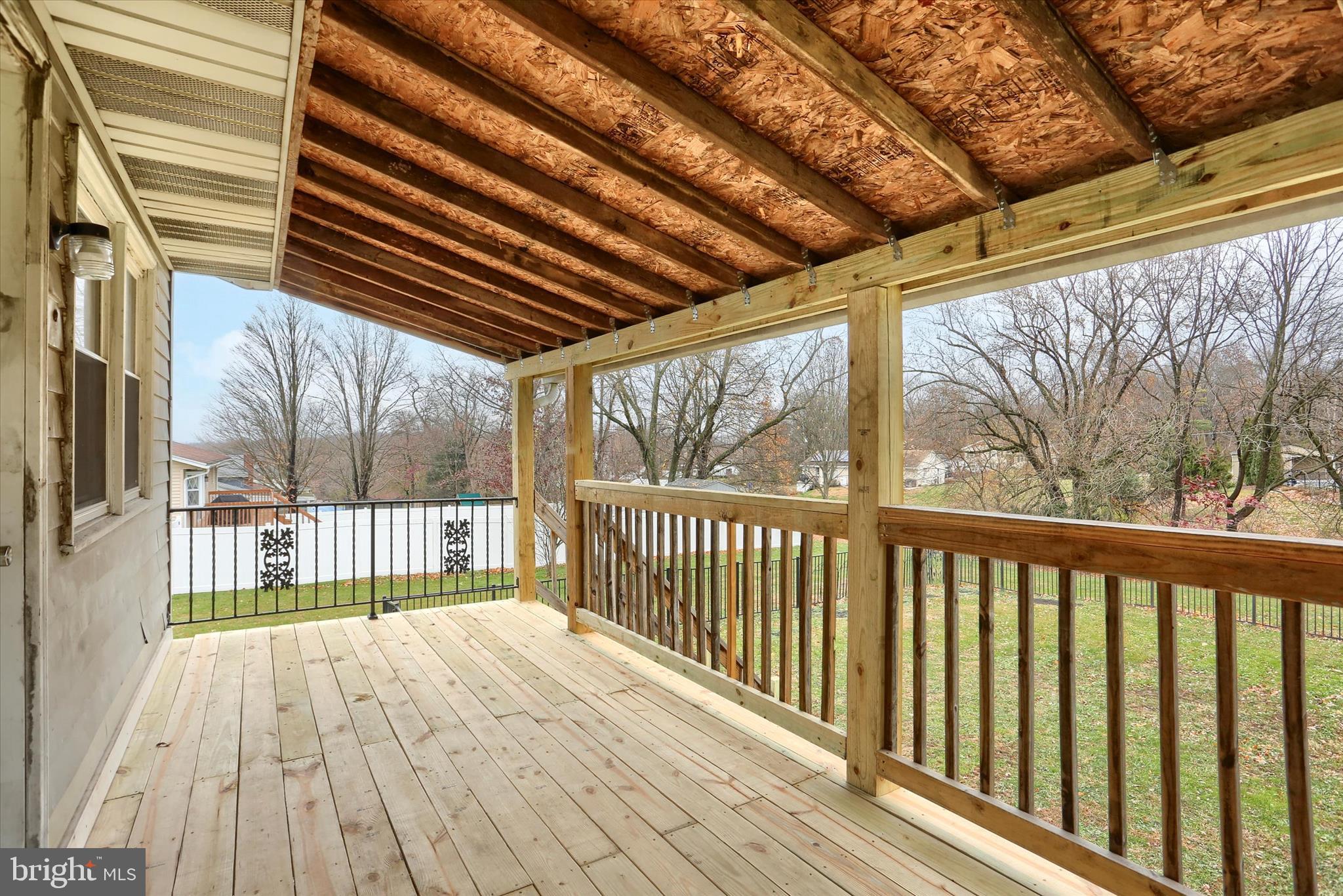 127 Spring Road Dillsburg, PA 17019 - Photo 4 of 39 a view of balcony with wooden floor