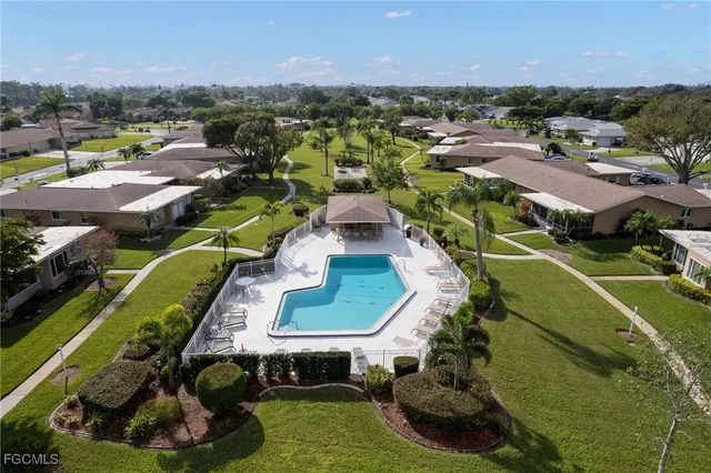 an aerial view of a house with a garden