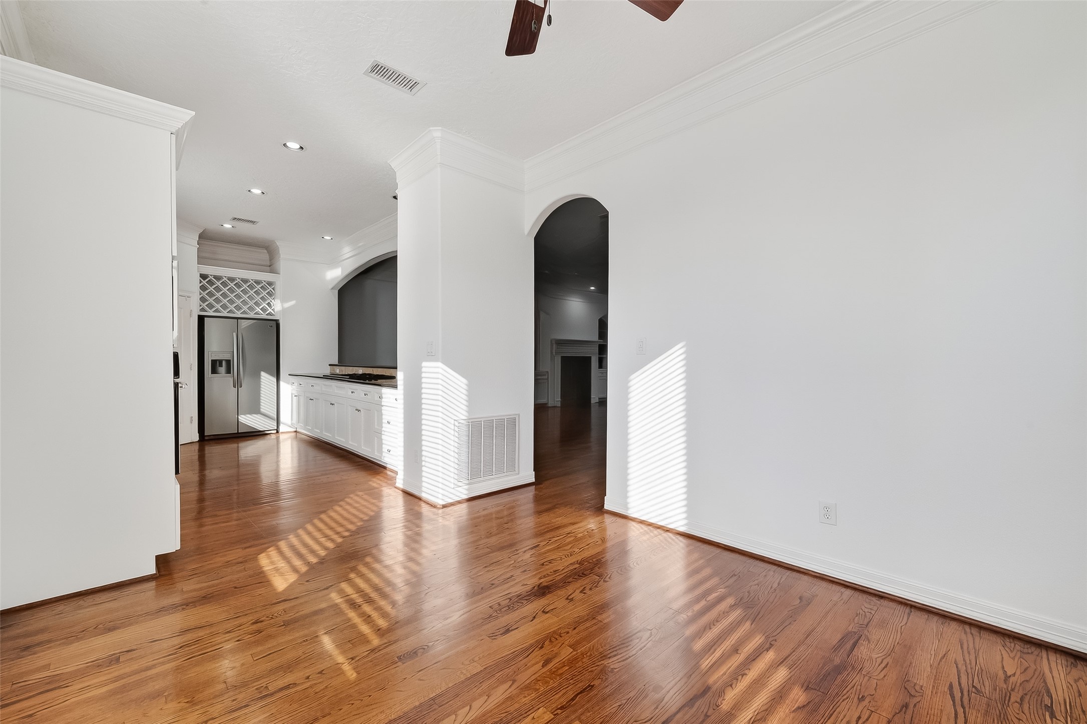 1002 West 22nd Street Houston, TX 77008 - Photo 16 of 43 a view of empty room with wooden floor