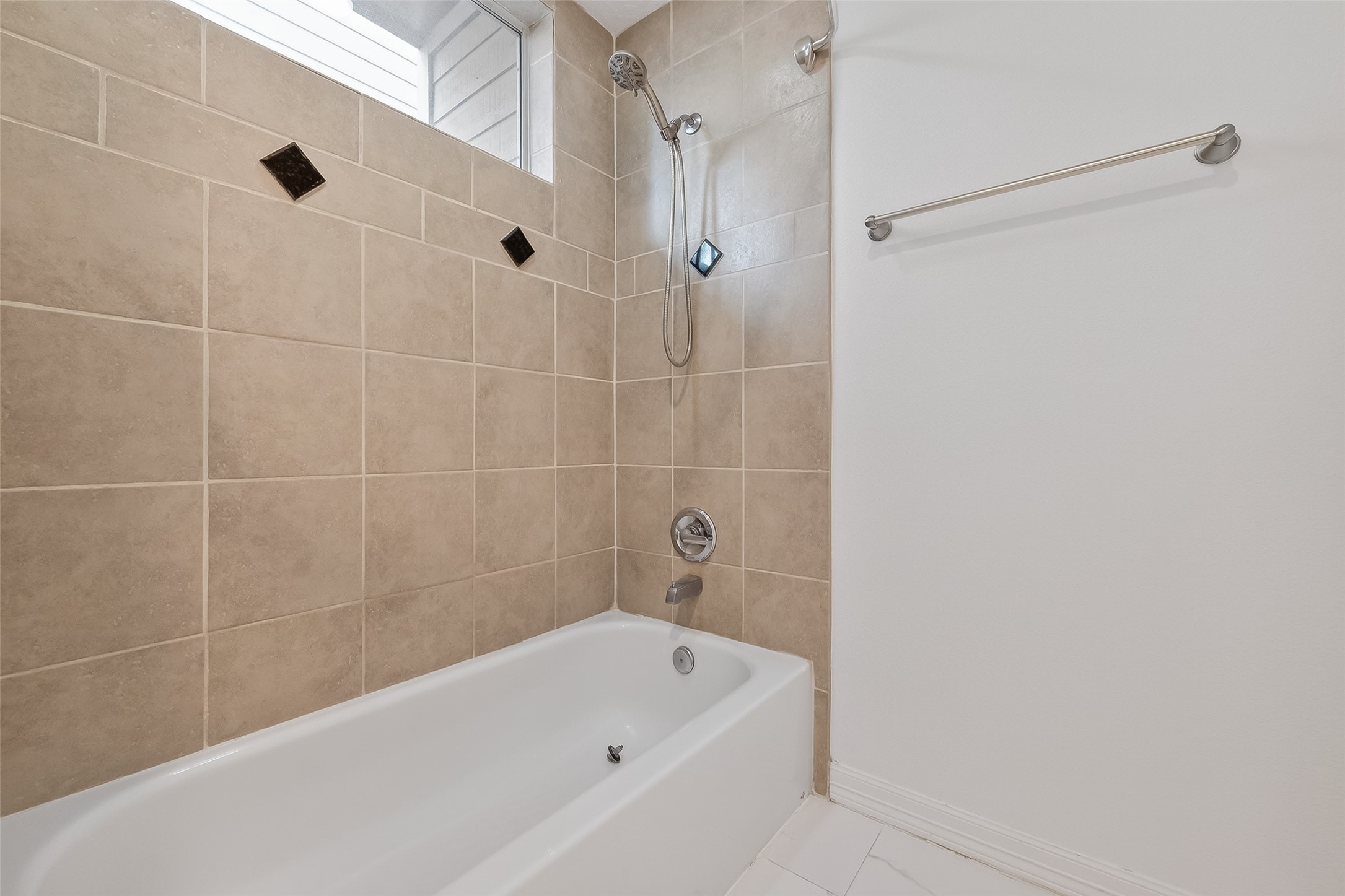 1002 West 22nd Street Houston, TX 77008 - Photo 29 of 43 a bathroom with a bathtub and shower