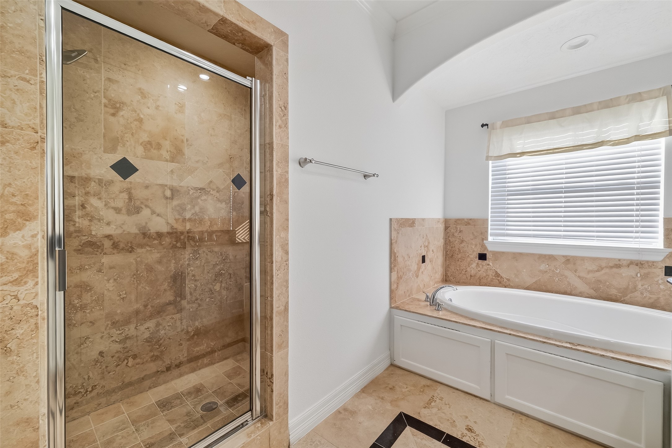 1002 West 22nd Street Houston, TX 77008 - Photo 37 of 43 a bathroom with a bathtub and a shower