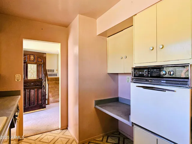 a kitchen with a sink and a window