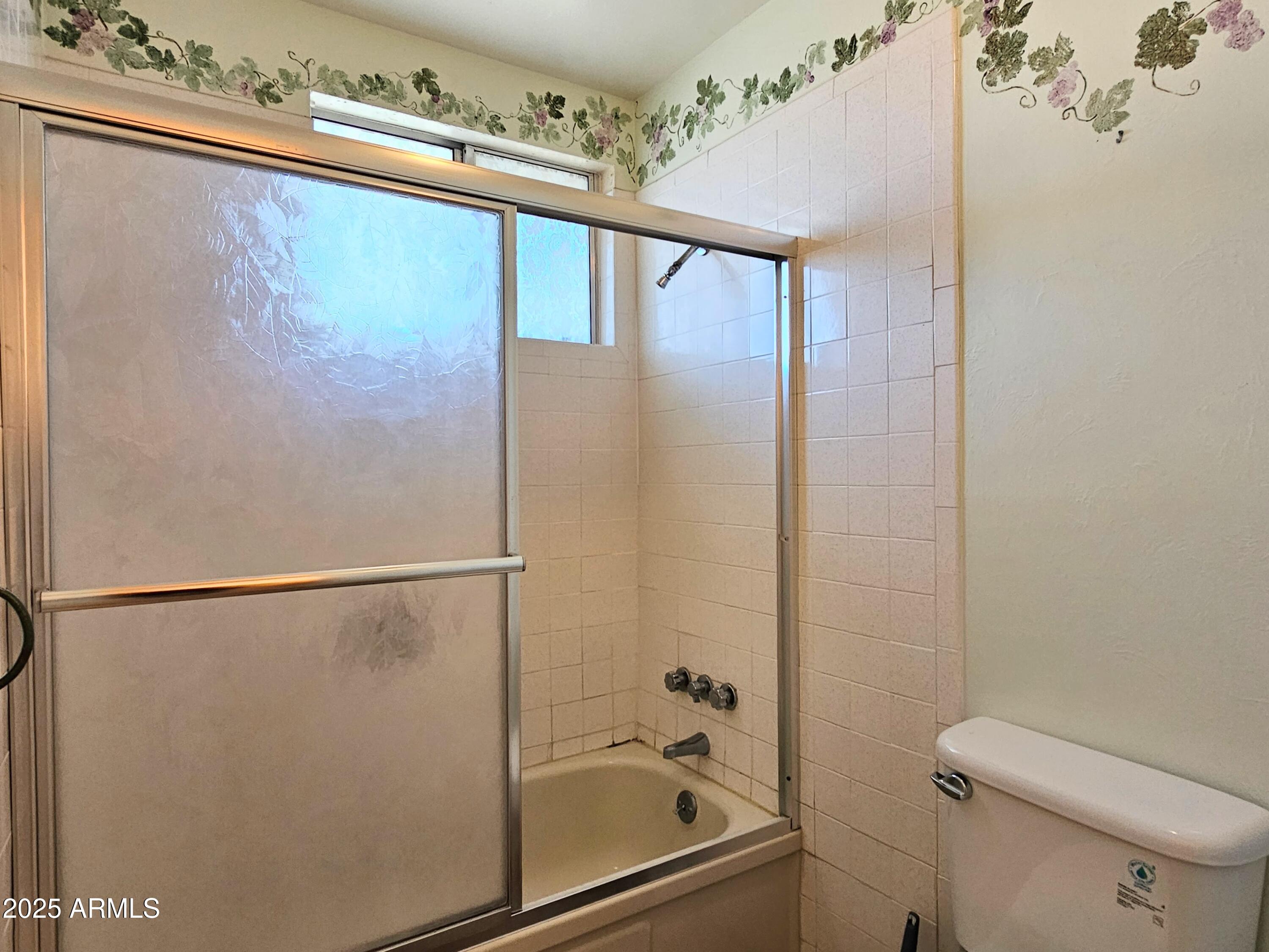 85 Pima Drive Bisbee, AZ 85603 - Photo 30 of 44 a bathroom with a shower and a toilet