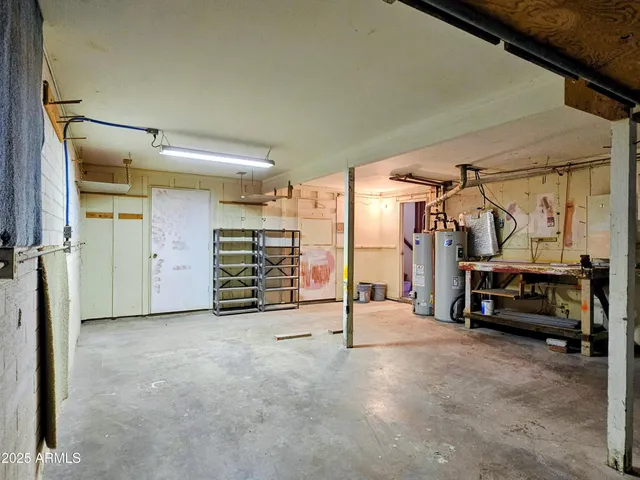 a view of a backyard with swimming pool