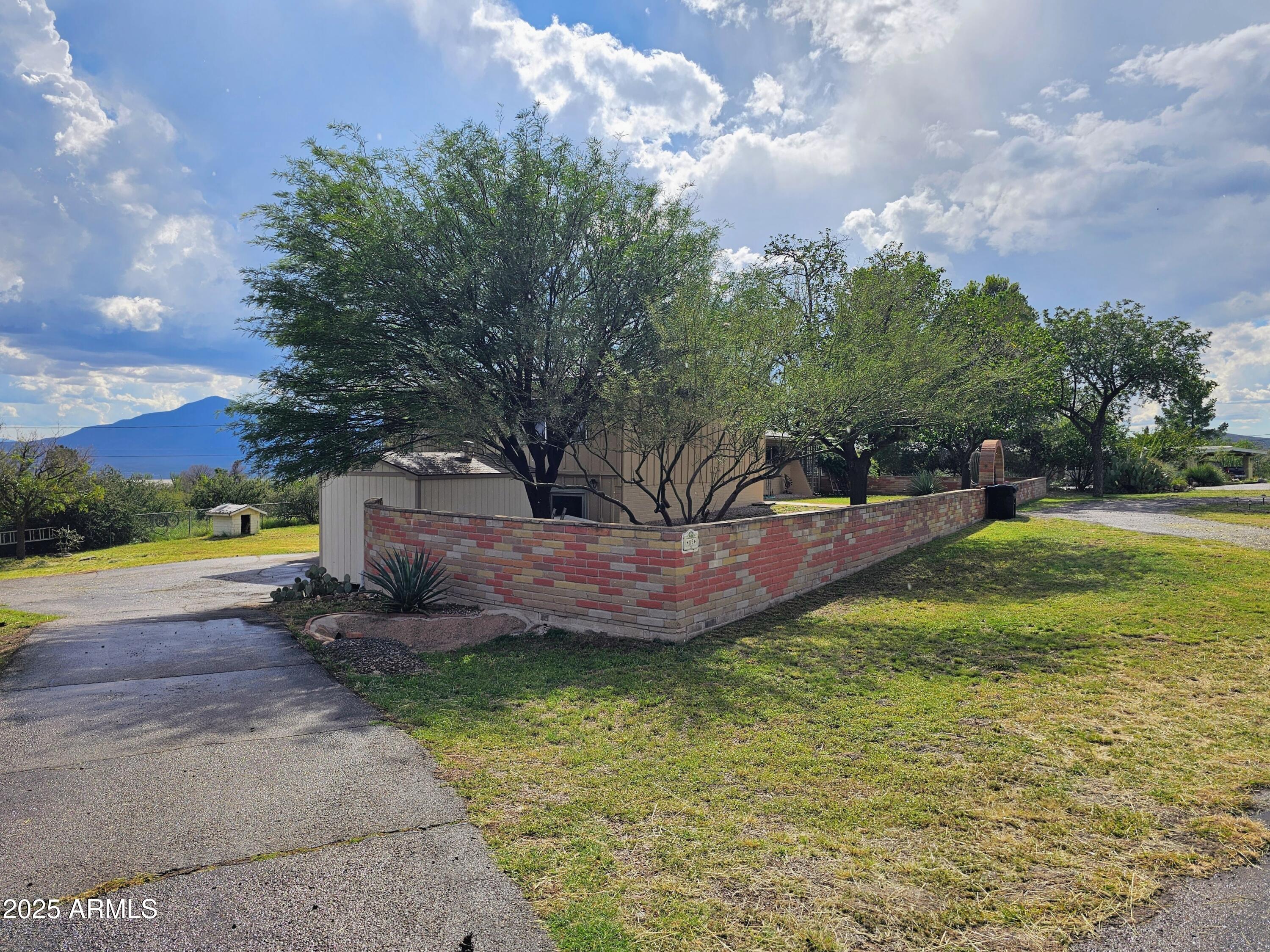 85 Pima Drive Bisbee, AZ 85603 - Photo 38 of 44 a view of a backyard with swimming pool