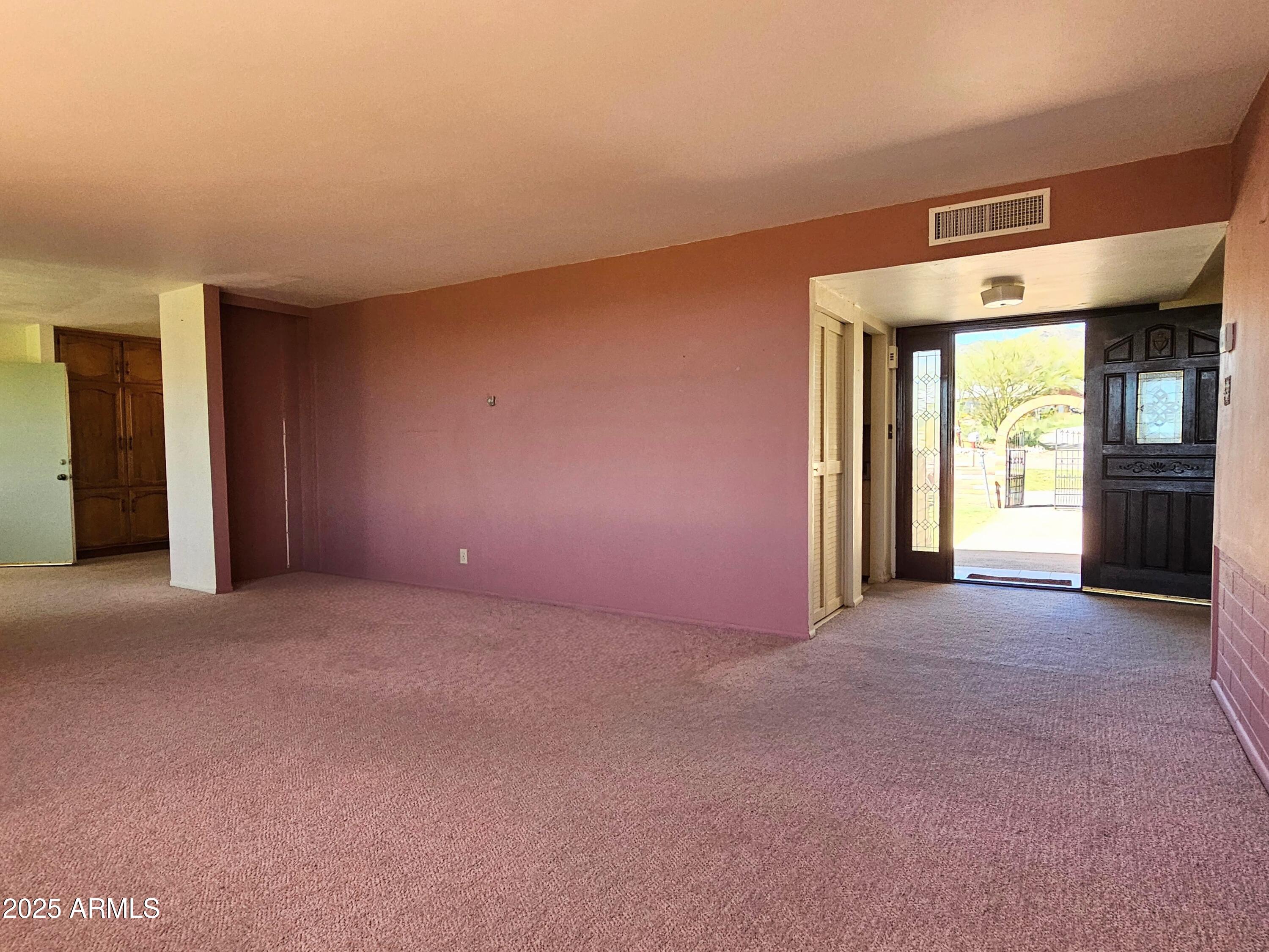 85 Pima Drive Bisbee, AZ 85603 - Photo 8 of 44 a view of empty room with a fireplace