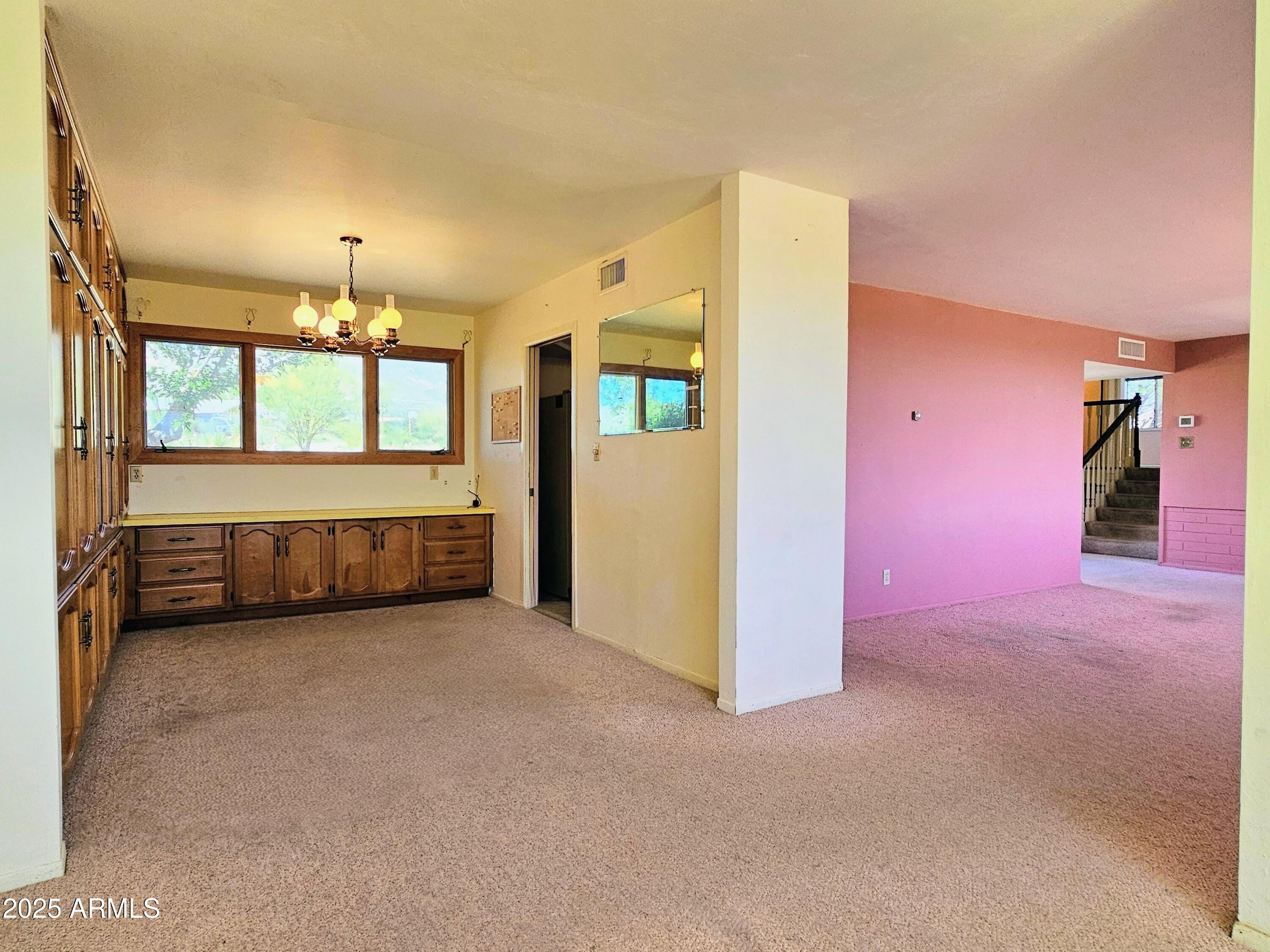 85 Pima Drive Bisbee, AZ 85603 - Photo 10 of 44 a view of an empty room with a window