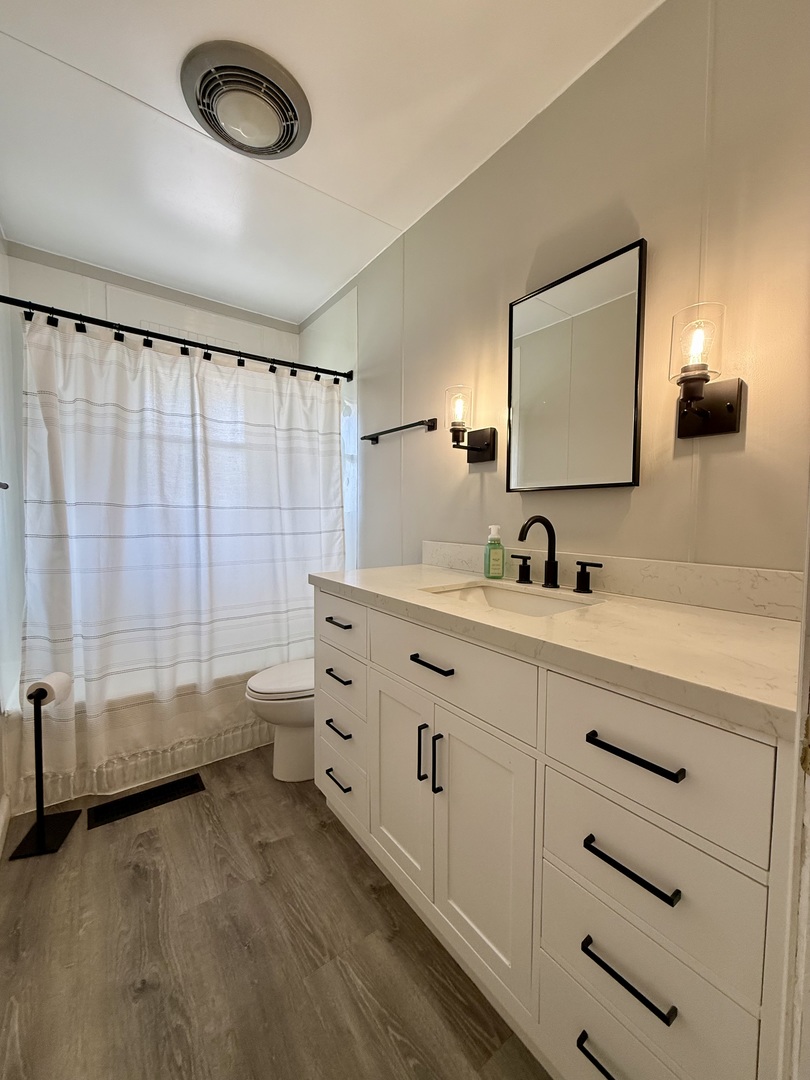 308 Illinois Drive Rantoul, IL 61866 - Photo 12 of 17 a bathroom with double vanity and a mirror