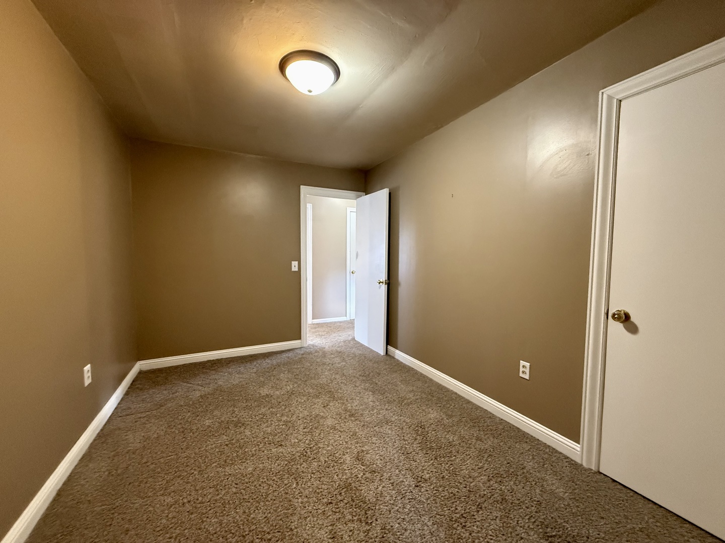 308 Illinois Drive Rantoul, IL 61866 - Photo 13 of 17 an empty room with an entryway