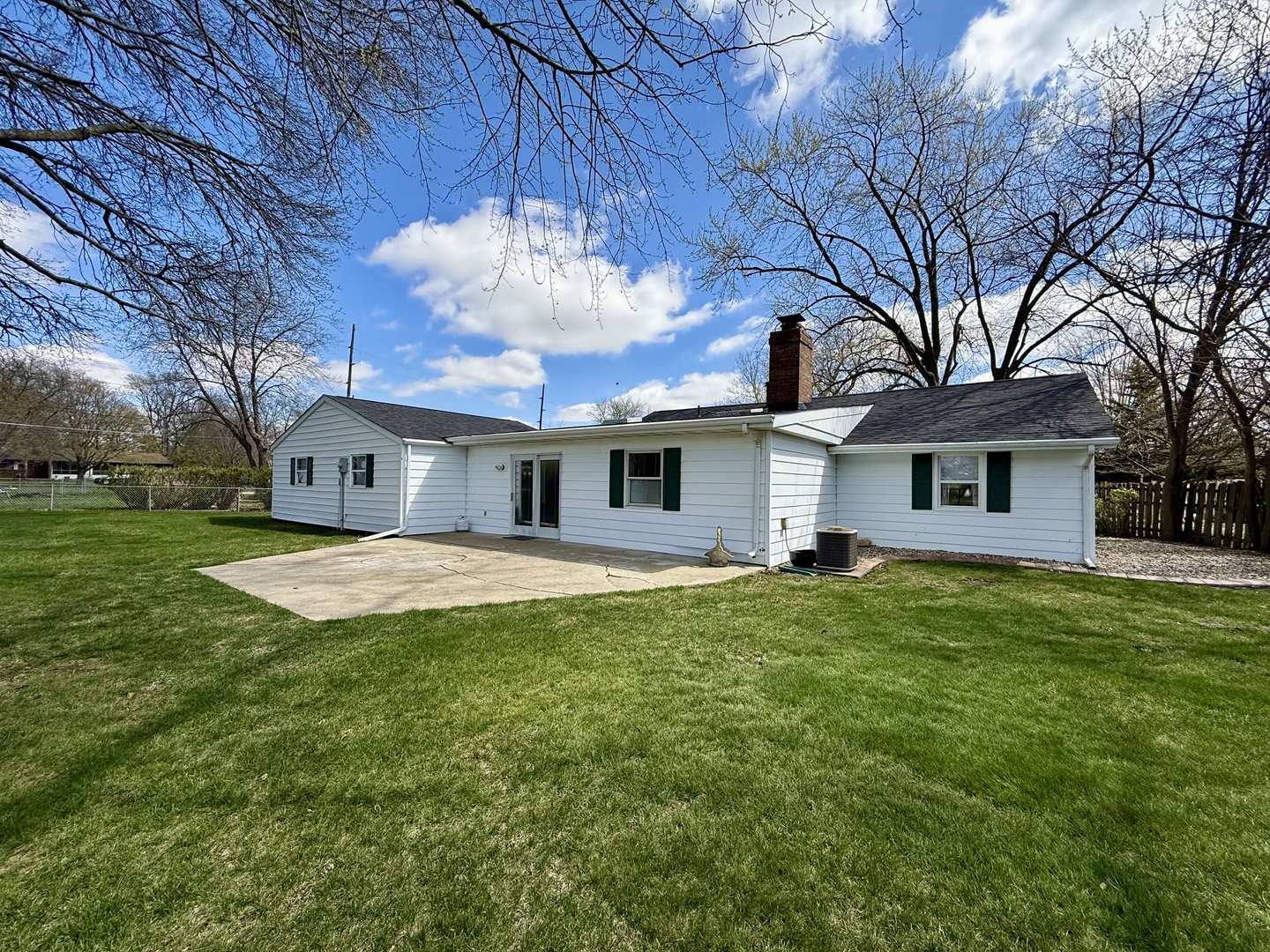 308 Illinois Drive Rantoul, IL 61866 - Photo 15 of 17 a front view of a house with a yard
