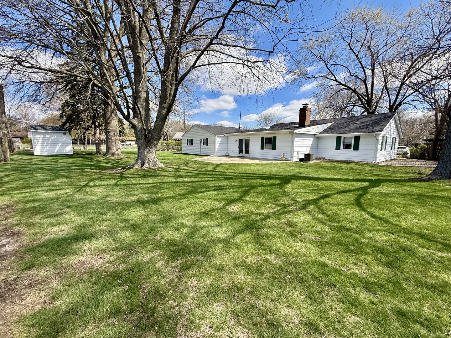 308 Illinois Drive Rantoul, IL 61866 - Photo 16 of 17 front view of a house with a yard