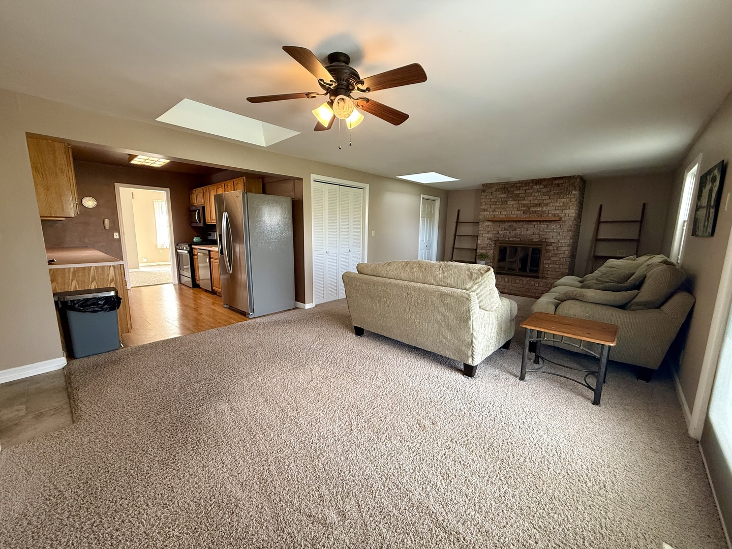308 Illinois Drive Rantoul, IL 61866 - Photo 7 of 17 a living room with furniture and kitchen