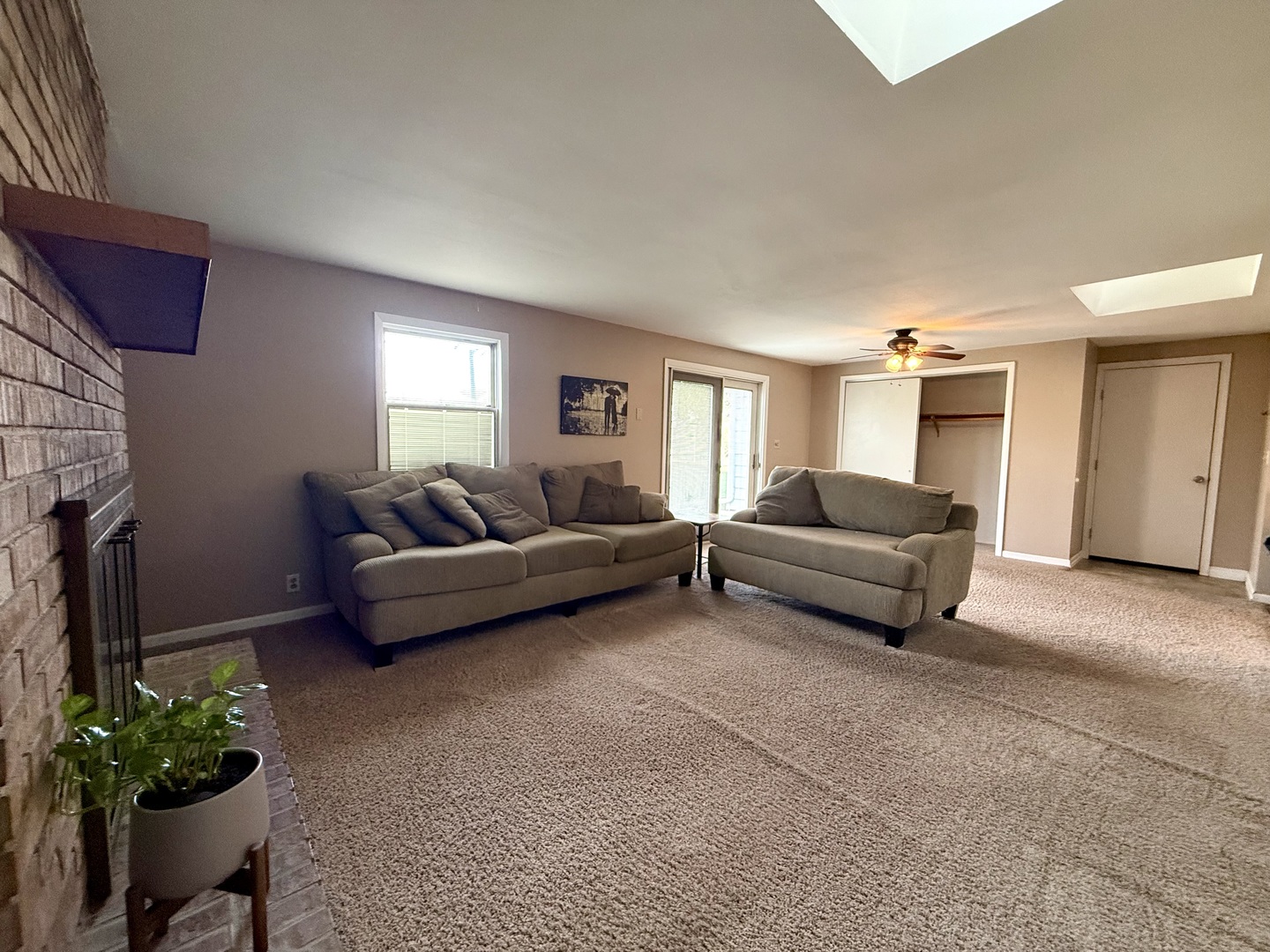 308 Illinois Drive Rantoul, IL 61866 - Photo 9 of 17 a living room with furniture and a fireplace