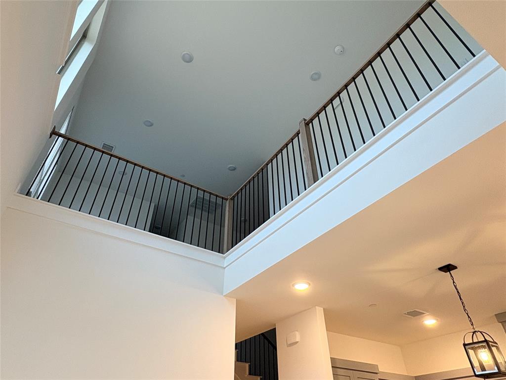 2528 Brunswick Way Allen, TX 75013 - Photo 6 of 8 a view of staircase with railing and white walls