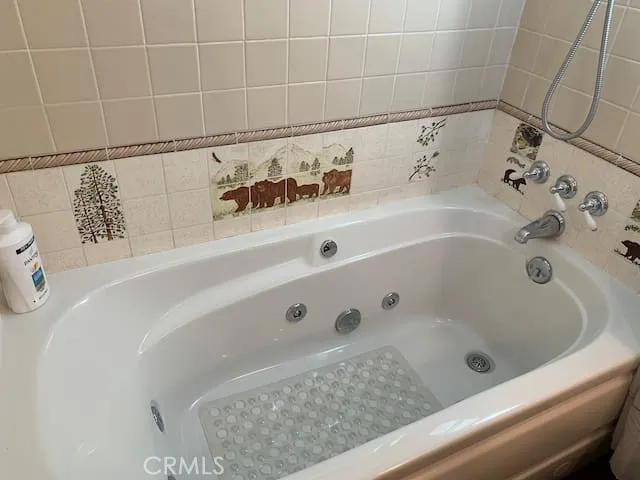 a bathroom with a bathtub