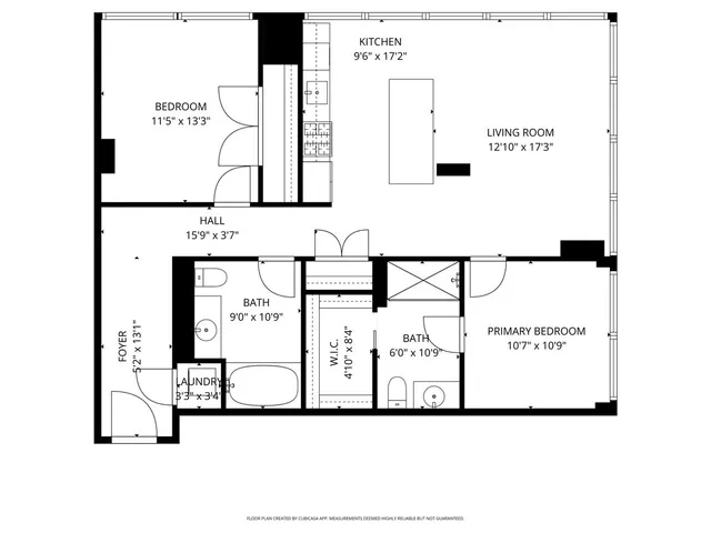 a kitchen with lots of counter and chairs