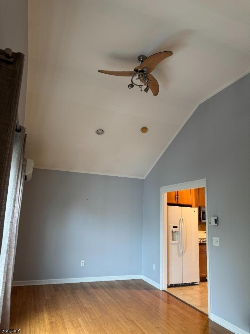 205 Valley Brook Avenue, Unit 1 Lyndhurst, NJ 07071 - Photo 6 of 6 a view of a room with wooden floor and cabinet