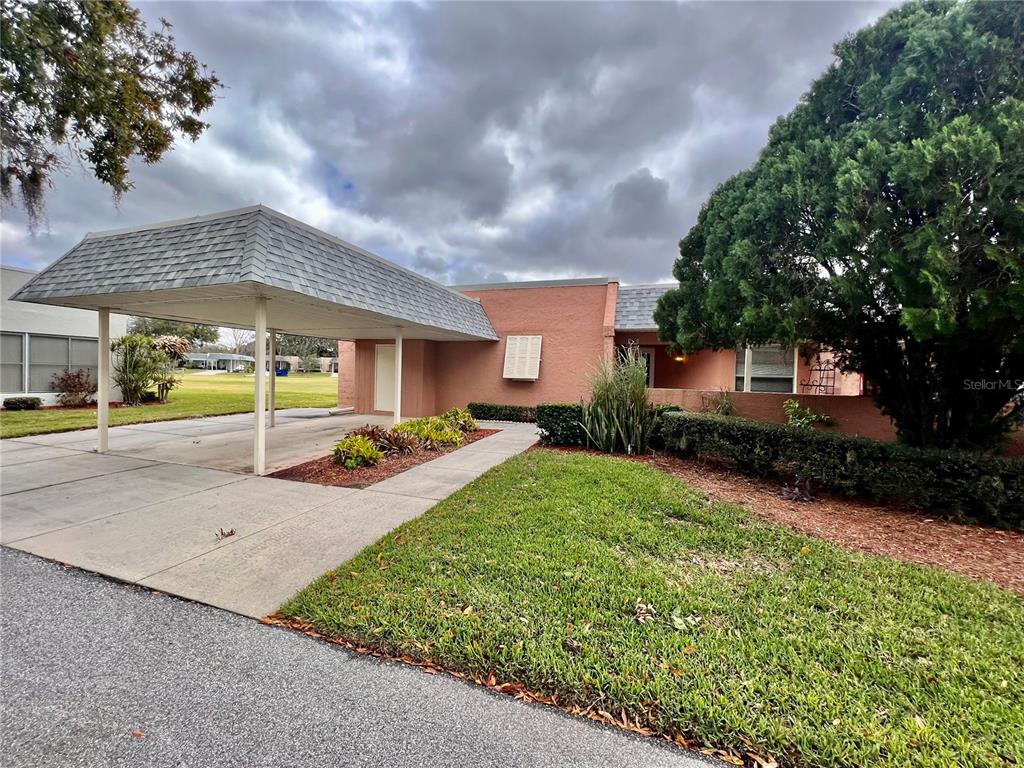 3938 Trophy Boulevard New Port Richey, FL 34655 - Photo 1 of 1 a view of a backyard with sitting area
