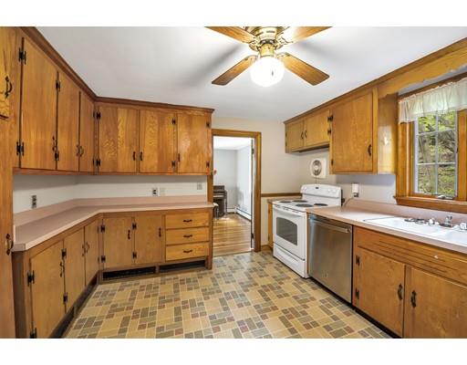 17 Surrey Road Salem, MA 01970 - Photo 9 of 28 a kitchen with sink cabinets and window