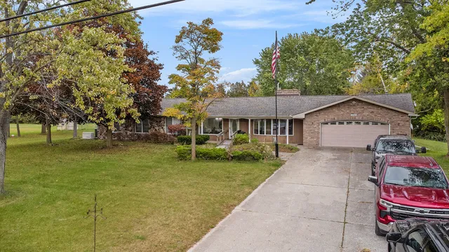 $320,000 | 2749 8 Mile Road, Auburn, MI 48611