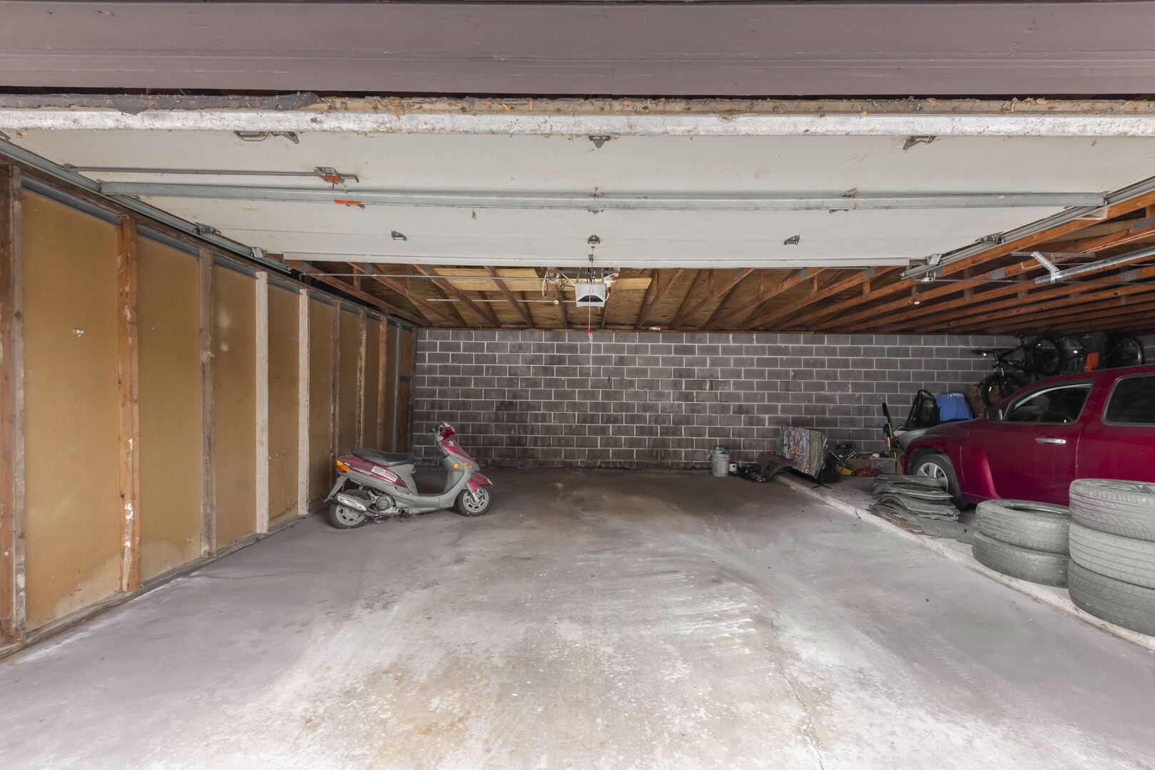 548 Timber Ridge Drive, Unit 108 Carol Stream, IL 60188 - Photo 13 of 18 a view of a garage with an empty space
