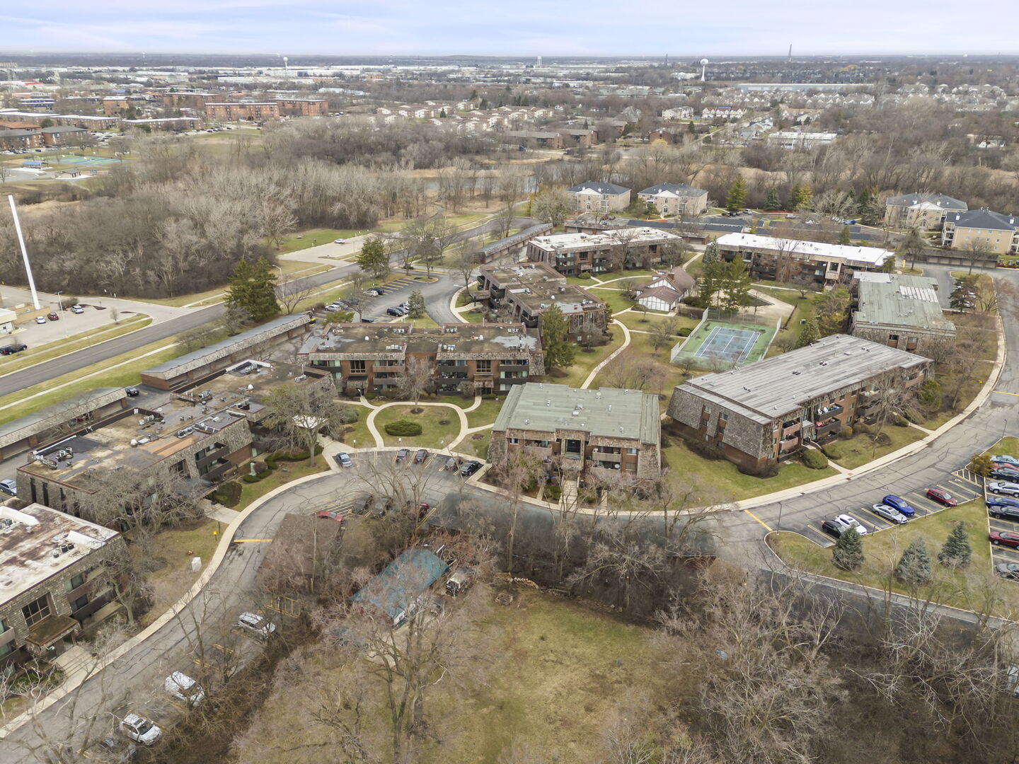 548 Timber Ridge Drive, Unit 108 Carol Stream, IL 60188 - Photo 14 of 18 an aerial view of residential houses with outdoor space